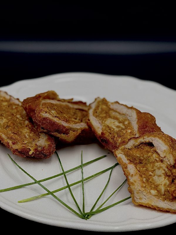 41. Velővel töltött karaj rántva (Fried pork chop stuffed with brain) 
